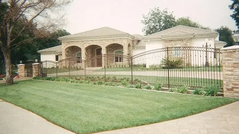 Ornamental Iron Property Line Fence in Newport Coast